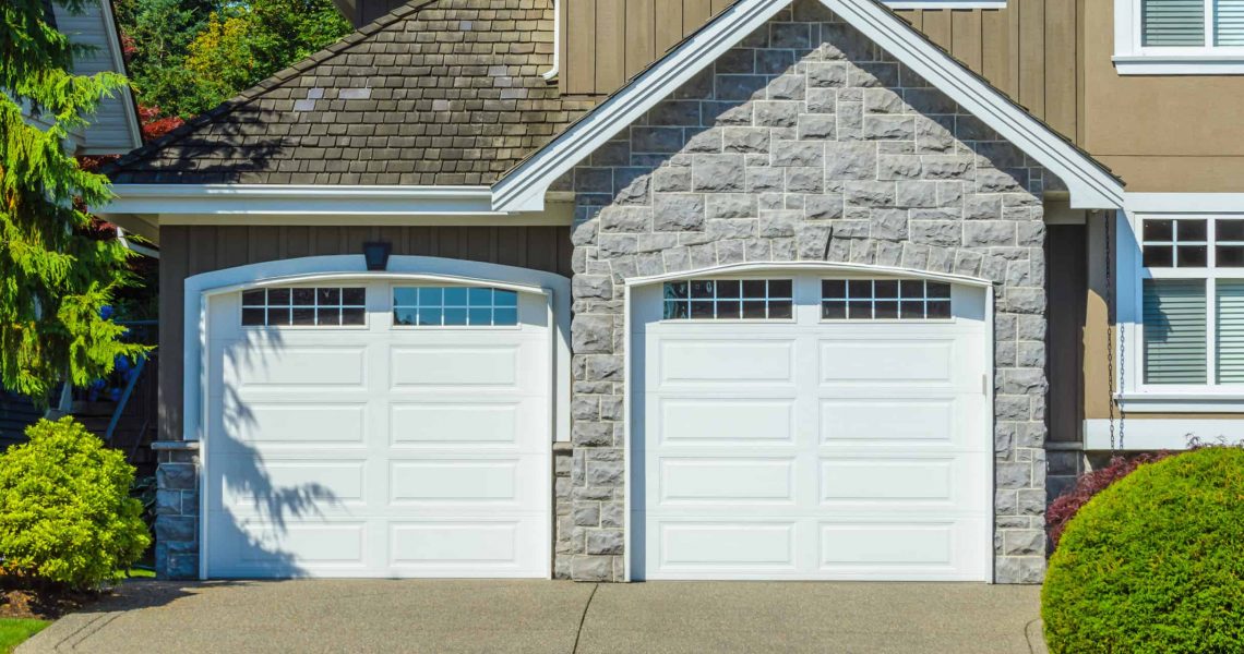 Garage with wide, long nicely paved driveway.; Shutterstock ID 365790491; PO: Zeus