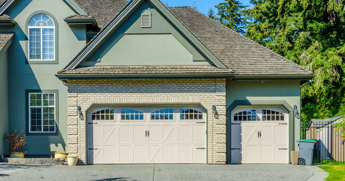 Garage, garage doors and driveway.; Shutterstock ID 611273114; PO: Zeus