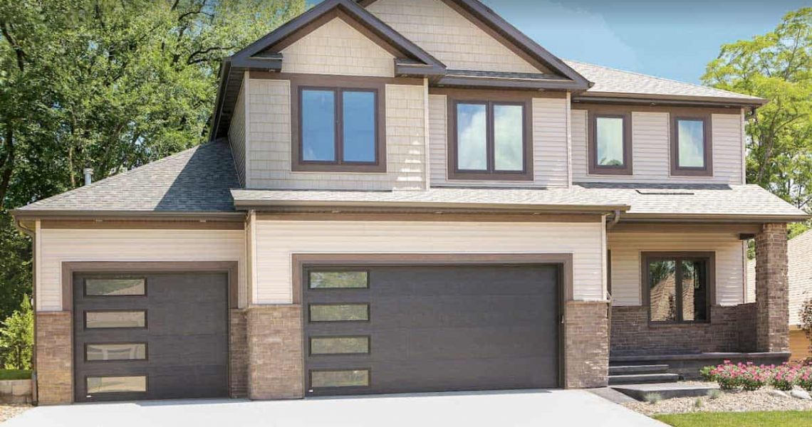 modern garage door with window on large house